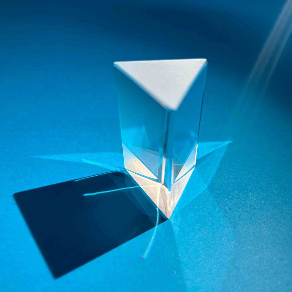 Prism casting a rainbow Photo | Adobe